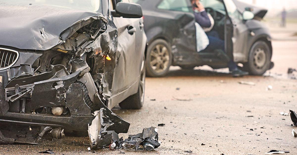 wrecked cars on the road after an accident